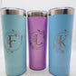 3 skinny tumblers in teal, light purple, and light blue on white background