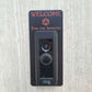 Black laminate doorbell surround with red 20 sided dice and lettering stating Welcome Ring for Initiative around Ring doorbell on gray background