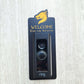 Black doorbell surround with gold dragon head and lettering stating Welcome Ring for Initiative around Ring doorbell on gray background
