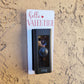White laminate doorbell surround with red heart and lettering saying hello Valentine on ring doorbell and tan background